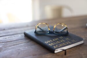 Photo of glasses on top of journal
